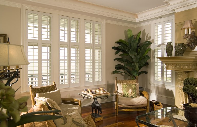 Living Room in Southern California with polywood plantation shutters.